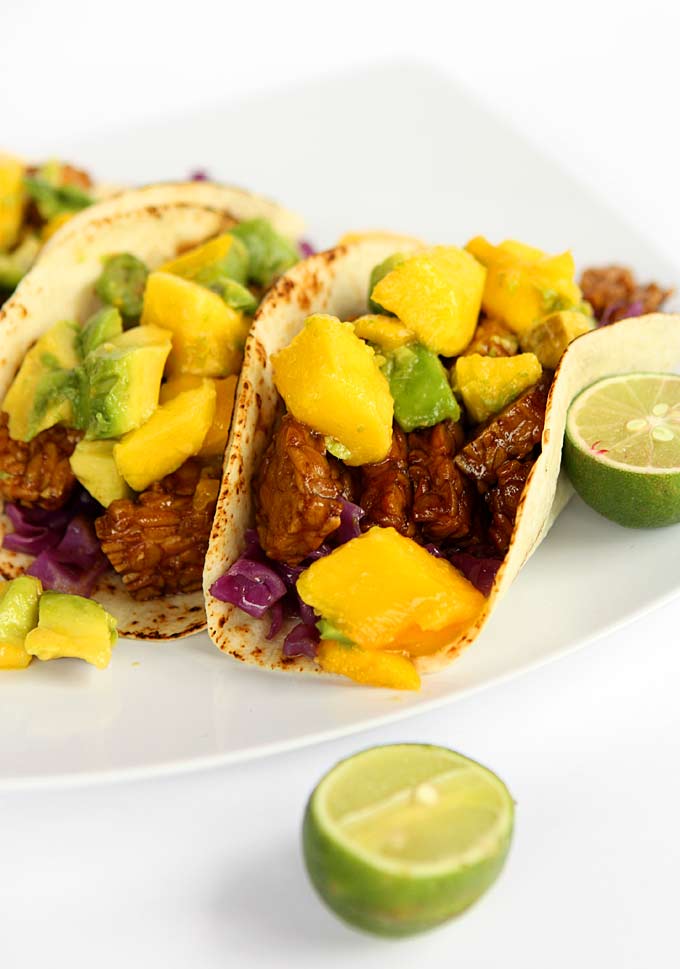 Honey Soy Tempeh Tacos with Mango Avocado Salsa | thekitchenpaper.com