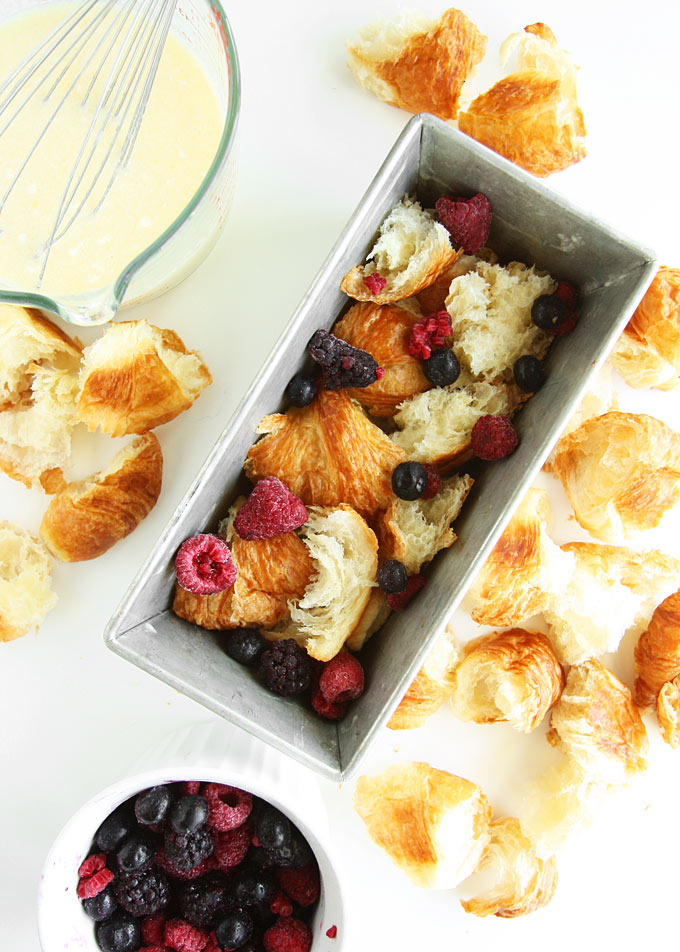 Mixed Berry Croissant Pudding with Whiskey Butter Sauce | thekitchenpaper.com