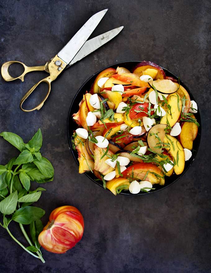 Stone Fruit Tomato Mozzarella Basil Salad Recipe | thekitchenpaper.com